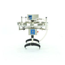 Пристрій для дозування, кремування і накачування меду з столом обертовим