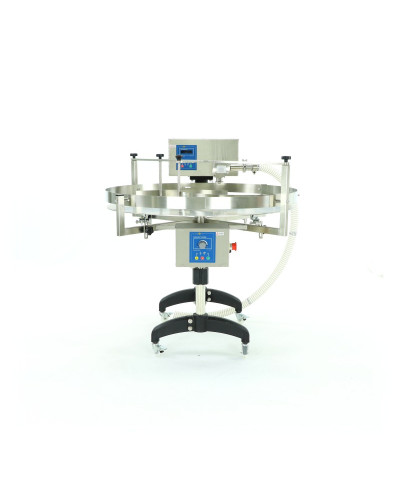 Пристрій для дозування, кремування і накачування меду з столом обертовим